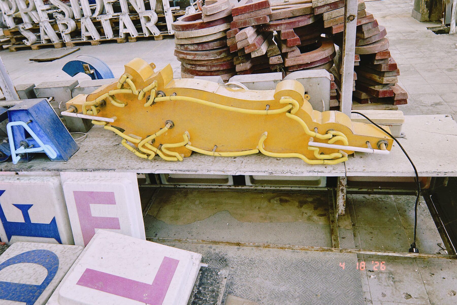 Illuminated pig sign at Museu dos Letreiros, Lisbon